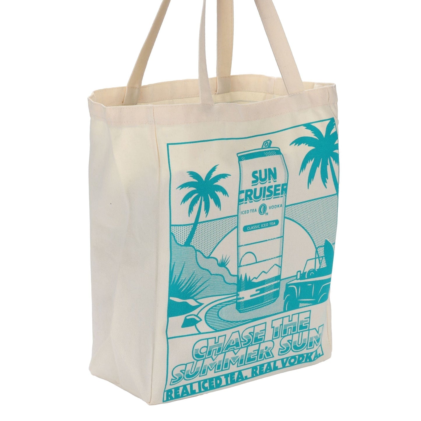 A three-quarter view of a cream-colored tote bag featuring a light blue graphic design. The design shows a can of 'SUN CRUISER' iced tea and vodka in the center, flanked by palm trees and a landscape. Text below the graphic reads 'CHASE THE SUMMER SUN' and 'REAL ICED TEA. REAL VODKA.