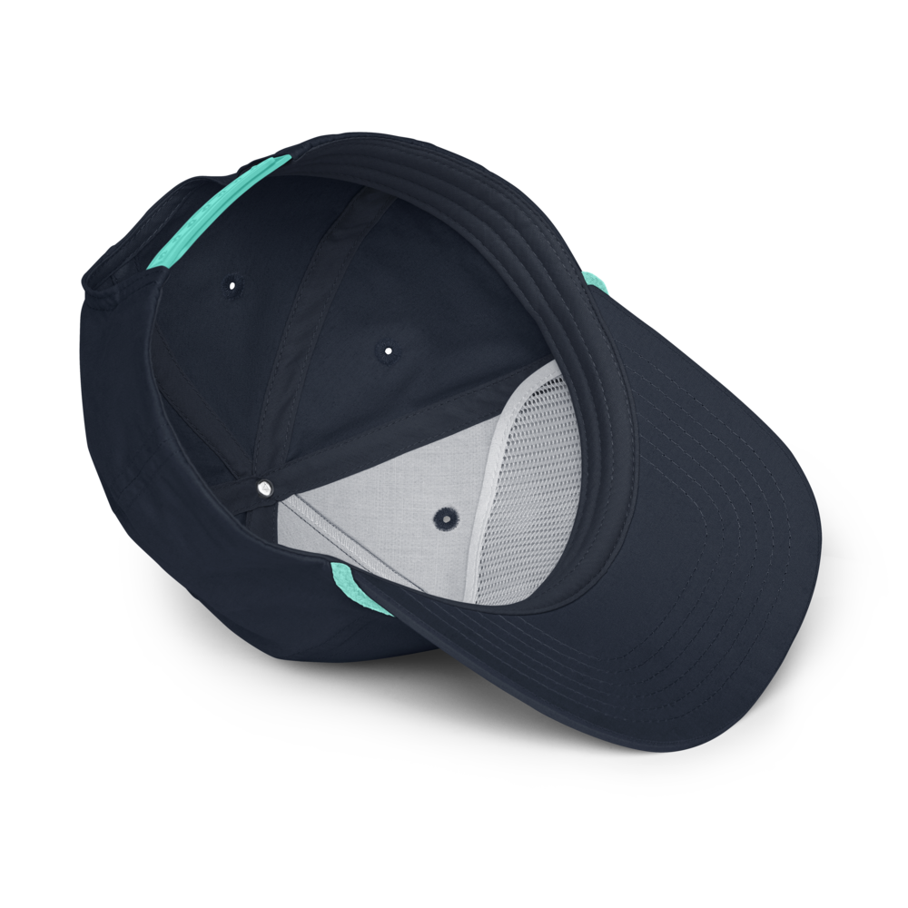 A dark navy blue baseball cap shown from an angled top-down view, featuring a light gray mesh ventilation panel on the underside and mint green accent stitching along the edge.