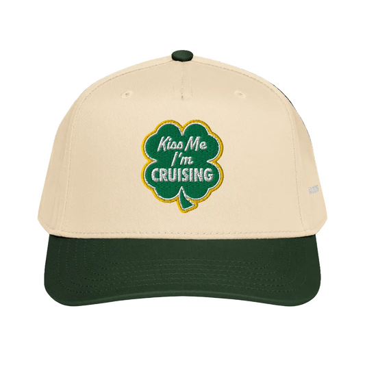 Beige and green cap with shamrock design and text on a white background