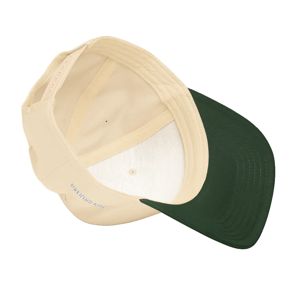 Beige and green baseball cap on a white background