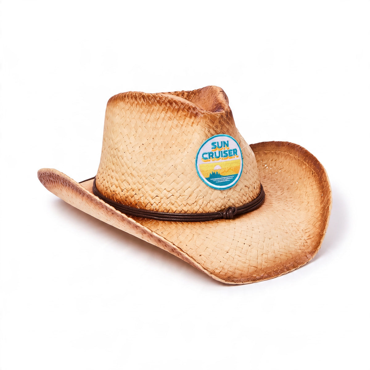 A straw cowboy hat with a brown band and a round 'Sun Cruiser' logo patch on the side, photographed on a clean white background.