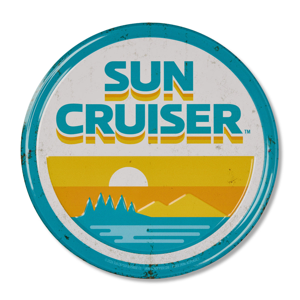 A round vintage-style metal sign featuring the 'Sun Cruiser' logo with a retro sunset landscape illustration, shown on a clean white background.