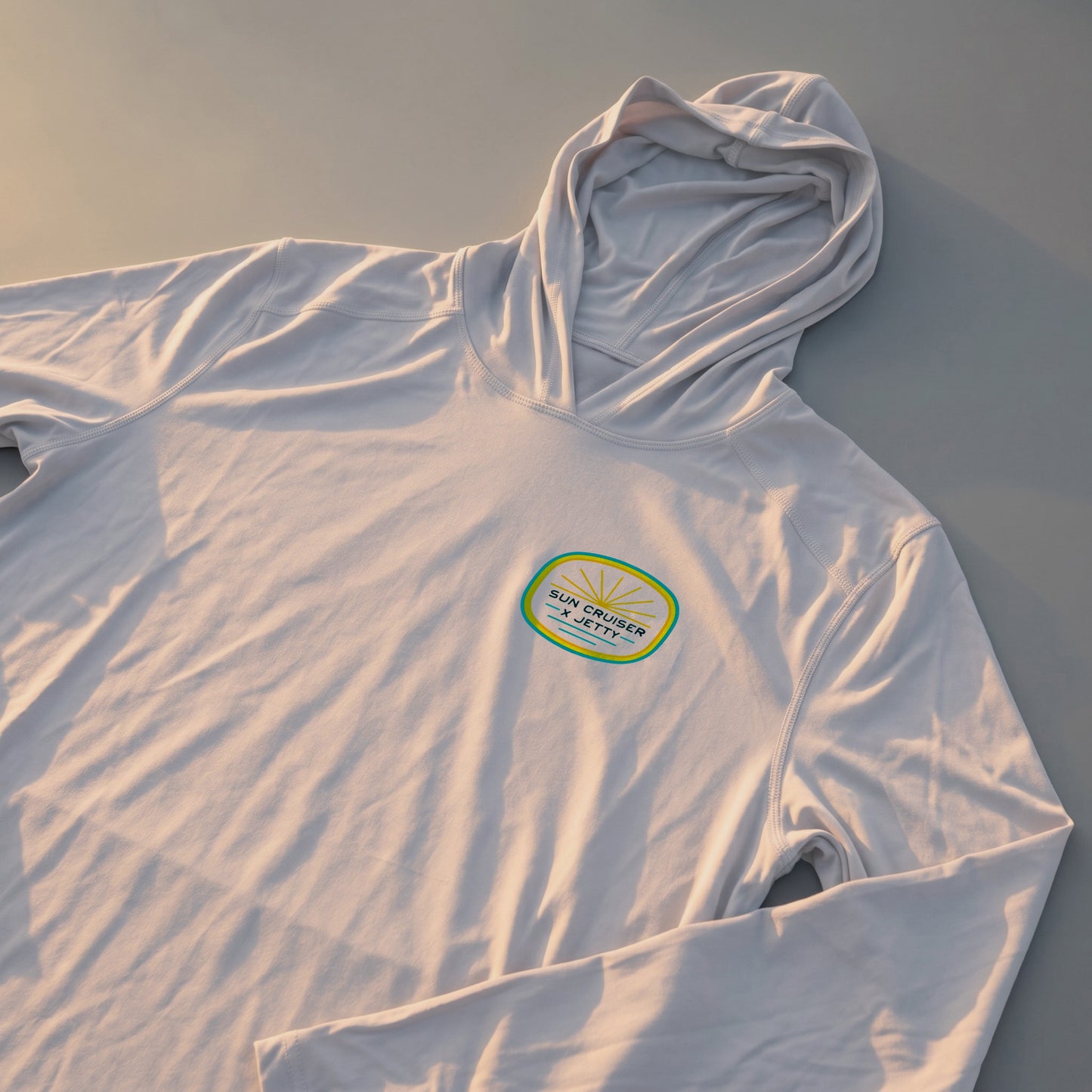 Sun Cruiser x Jetty Sun Seal Solar Hooded Shirt