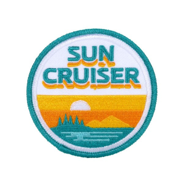 Classic sun cruiser logo on a circle patch.