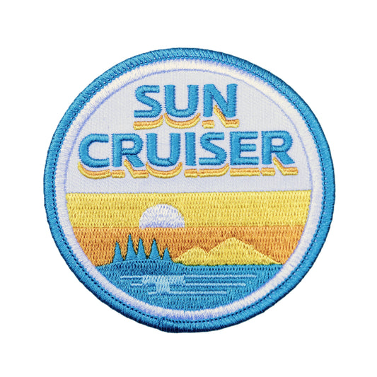 Sun cruiser logo on a circle patch.